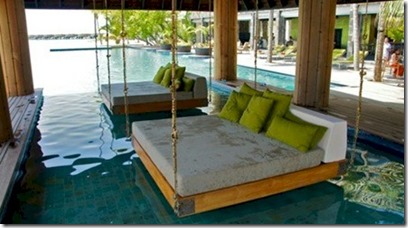 Anantara Kihavah Villas - pool swings